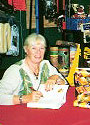 author karen a. lynch signs copies of her book the game of lies for gainesville, fl customers of the whip and spur tack shop.